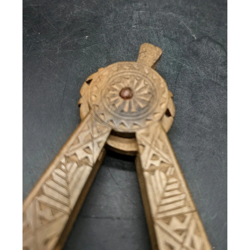 Vintage Hand Carved Wooden Nutcracker Geometric Folk Art Sunburst Design Brown